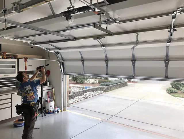 Garage door track repair service by Bellflower Garage Door Repair in Bellflower